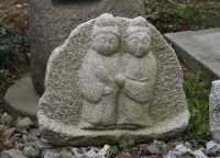 Stone figure, grand parents